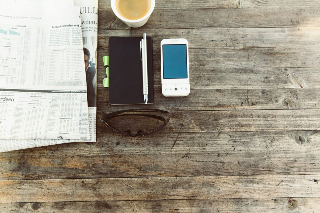 freelancer working on laptop with financial charts