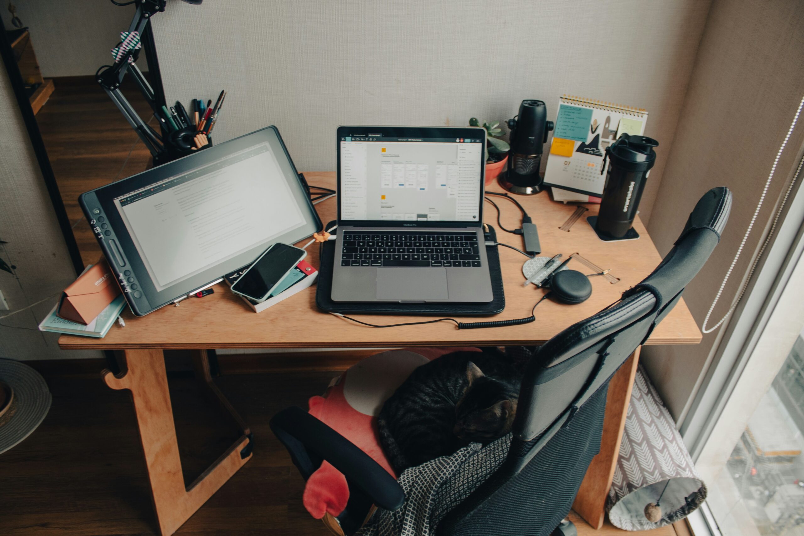 Freelancer working on laptop at a coffee shop