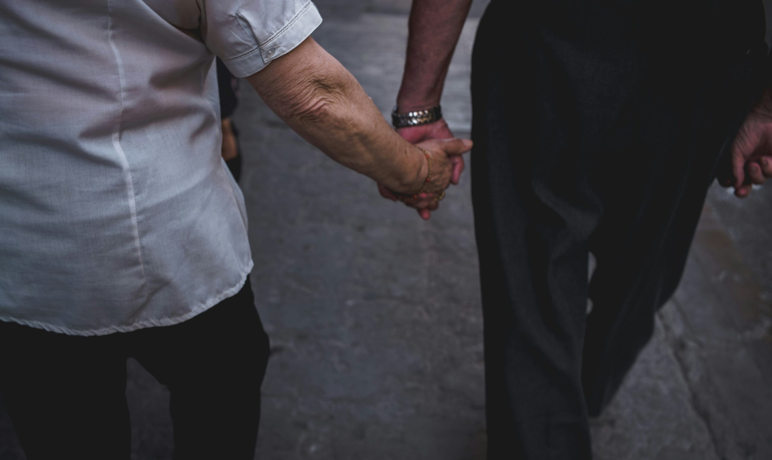 Illustration showing two people shaking hands over a contract