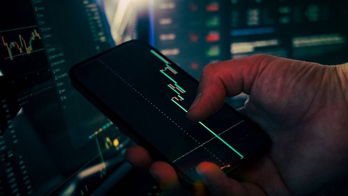 Illustration showing stressed freelancer surrounded by spreadsheets